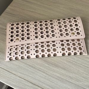 Pink and gold clutch